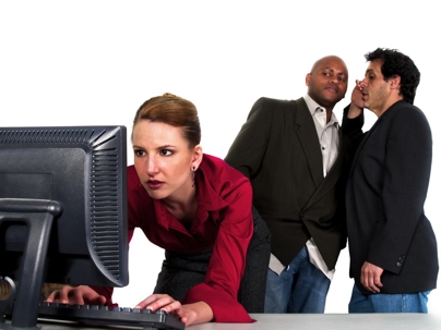 Office men leering at a woman