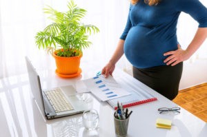 Pregnant woman at work