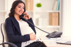 Pregnant woman on the phone