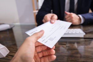 Employee receiving a final paycheck